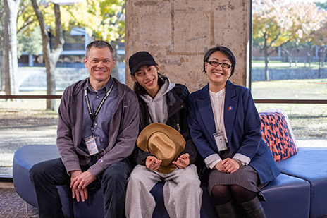 Michael Betzen, Ray Huang and Sunny Huang sitting together