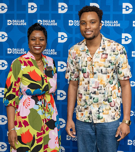Dr. Chiquesha Davis (left) with nursing student Nnamdi Izuegbu at the college’s launch party, smiling for a photo with a Dallas College backdrop.