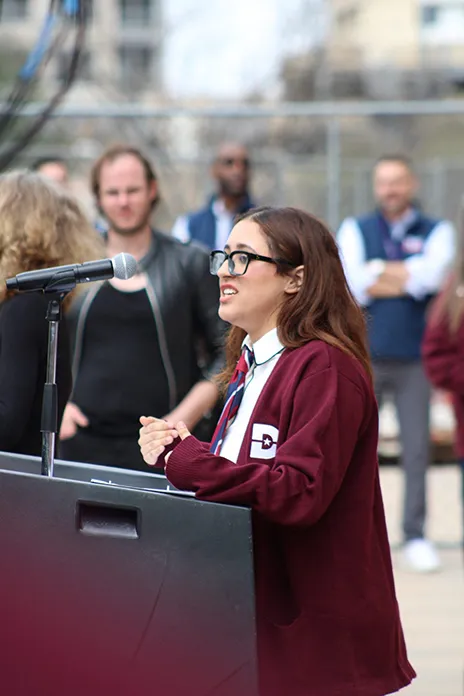 Malak Elkady, a student at Dallas College Richland Campus and Texas Junior College Student Government Association president, addresses the entire Community College Day group from the Capitol steps.