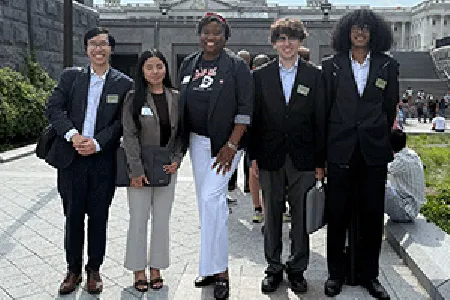 The CCIC Team pose in front of the capital in D.C.