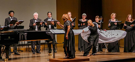 Professor conducting Brookhaven Pegasus Choral Society