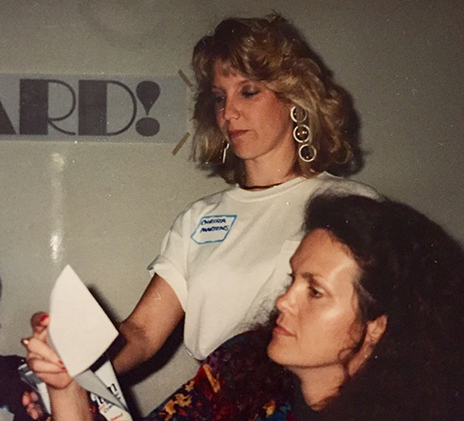 Two women working together