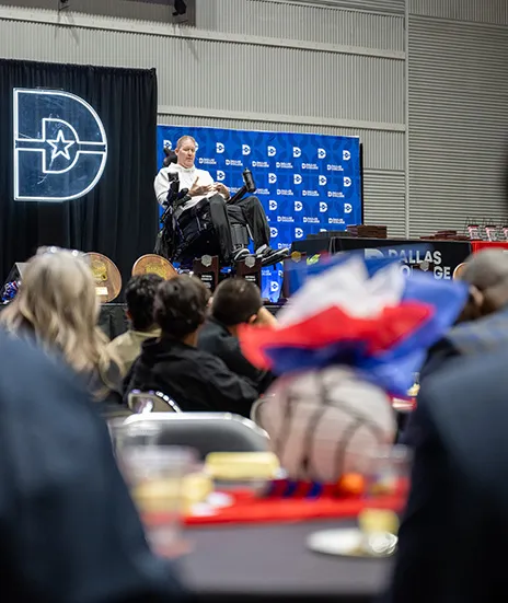 Shawn Bradley on stage giving keynote address.