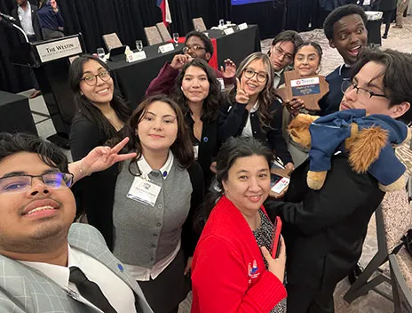 Group of students pose for selfie at Texas Junior College Student Government Association event.