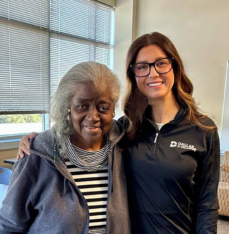 Cynthia Wilburn with her arm around Carolyn White