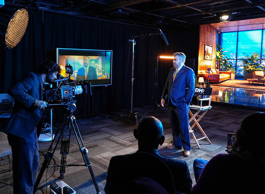 Dr. Lonon on-camera at virtual production soundstage launch.