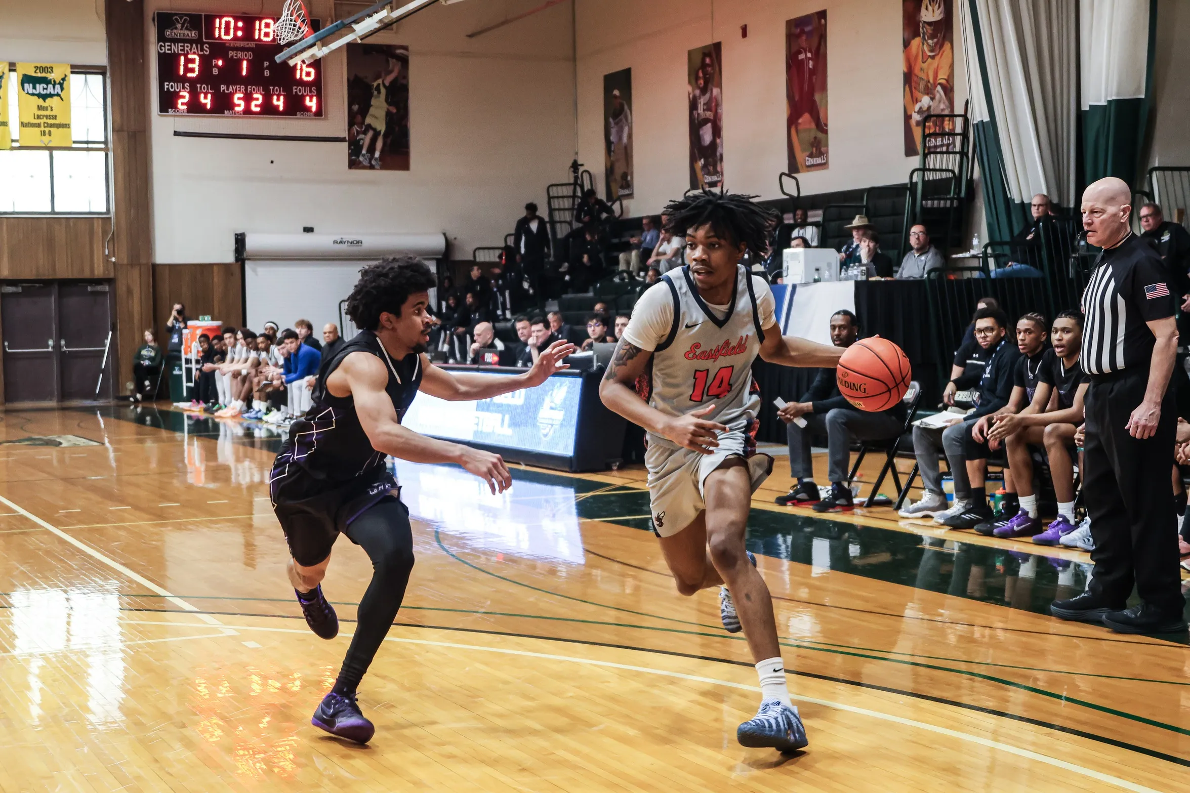 Eastfield Men's Basketball player dribbles the ball