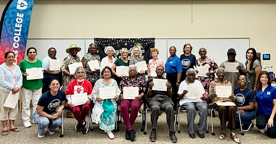 Large group of Lifelong Learners holding certificates