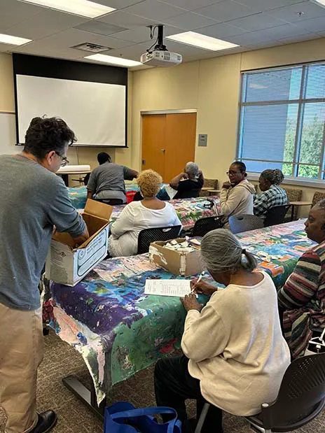Students making craft in Lifelong Learning classroom.