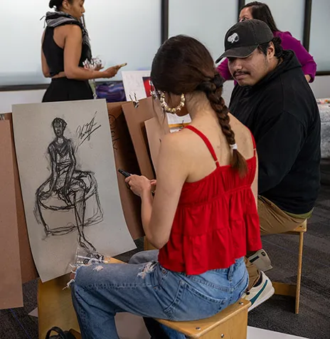 Student creating a sketch