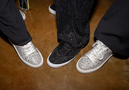 Three sparkling sneakers.