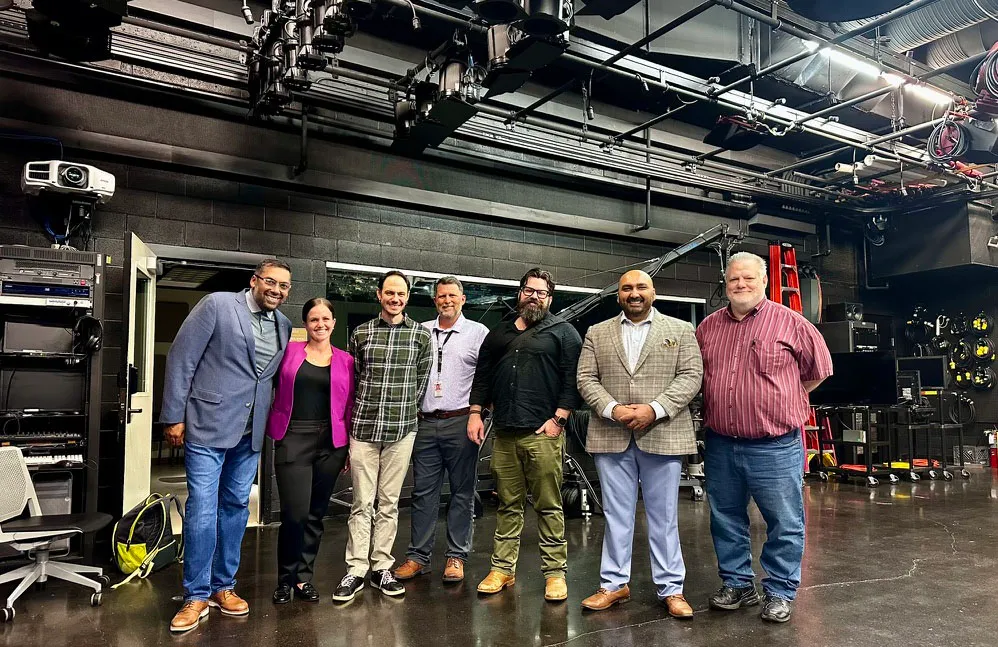 Seven people key to construction of the virtual production soundstage pose in the studio.