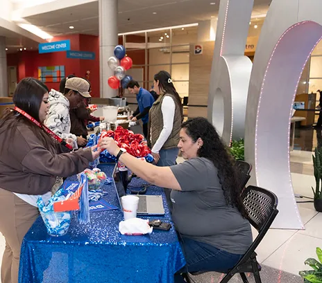 Students at 60th Anniversary table.