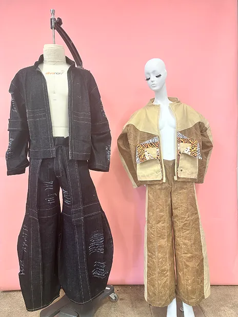 Two garments on mannequins.