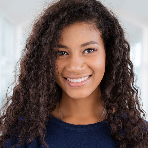 portrait photo of a female college student smiling