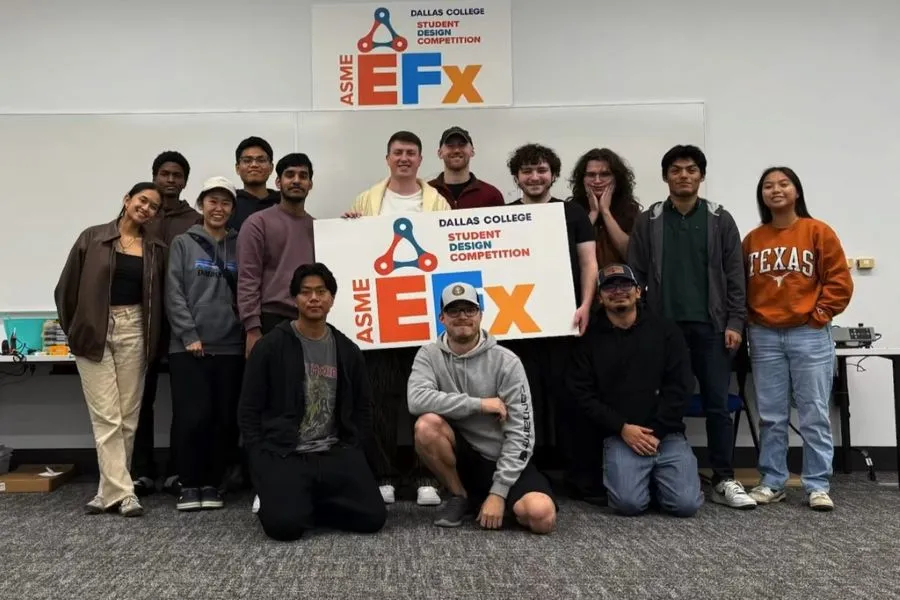 The Dallas College ASME team of students pose with the EFx sign