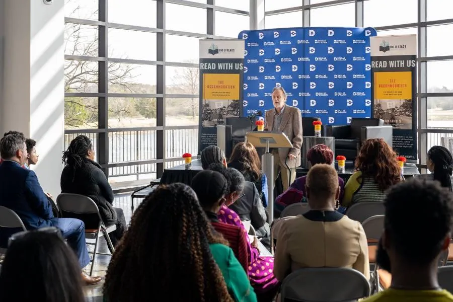 A speaker presents at a community event at Cedar Valley College