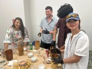 Navigators making mofongo laughing