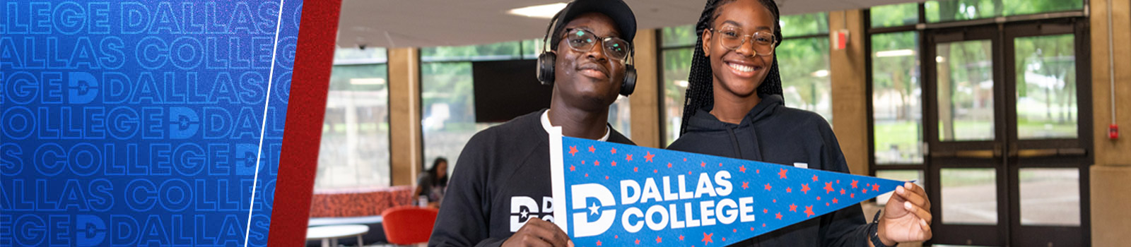 Students hold a Dallas College pennant