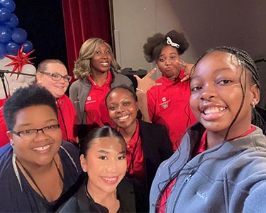 Students pose for a selfie at the Fall Student Leadership Conference November 2024